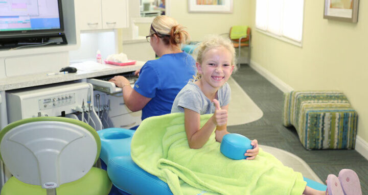 Girl in dentist chair